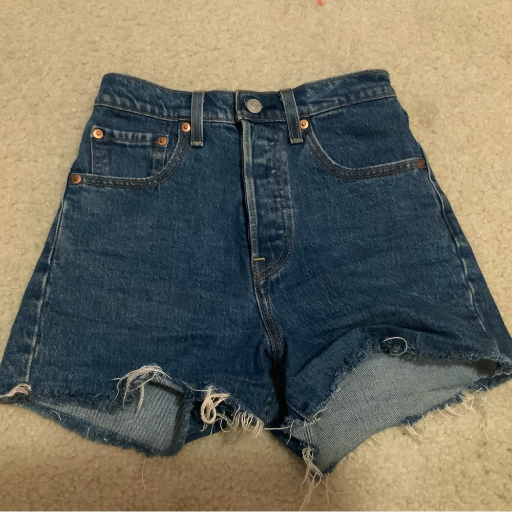 dark wash high rise multi button levi cutoffs